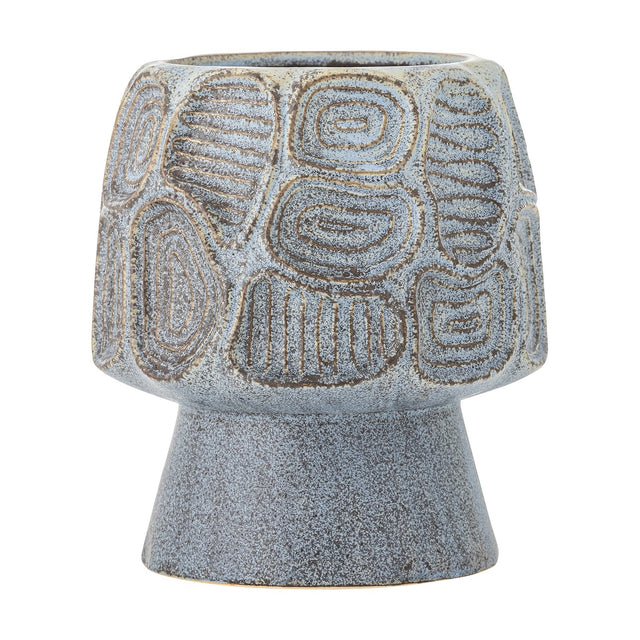 Clarke Stoneware Plant Pot in blue with a wide, rounded bowl on a tapering footed base, featuring textured panels of concentric rings and ridged lines, shown on a plain white background.