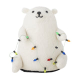 Wally Wool Christmas Decoration in white, a felted bear figure holding a string of colourful bulb lights, shown on a plain white background.