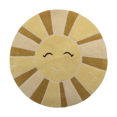 Round wool kids rug, 110cm, shaped like a smiling sun with a closed-eye face and alternating yellow rays, shown on a plain white background.