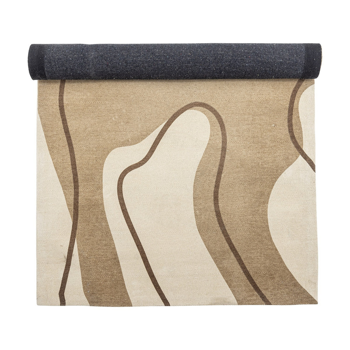 Volano Wavy Cotton Rug 150x90cm in Natural, rolled to show a dark grey border and a wavy beige and brown pattern on a cream cotton base, against a white background.