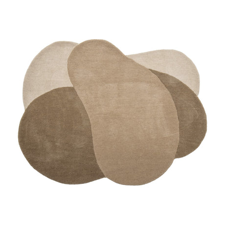 Denton Wool Rug 140x110cm in Brown, featuring overlapping pebble-shaped forms in light to deep brown tones, shown on a plain white background.