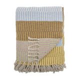 Isnel Yellow Striped Throw folded to show multicoloured woven bands in blue, brown, pink and yellow with knotted tassel fringe, on a white background.