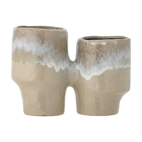 Maiak Stoneware Plant Pot in beige, a joined double-pot design with uneven heights and a glossy white glaze dripping from each rim, shown on a plain white background.