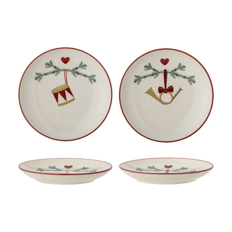 Yule Stoneware Christmas Plates Set of 2 in cream, side plates with red rims featuring pine sprigs, hearts, and drum or horn ornament designs, shown flat and on their sides against a white background.