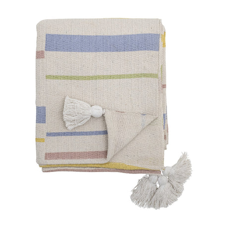 Pontino Striped Cotton Throw in cream, folded with blue, green, pink and yellow stripes and white corner tassels, shown on a plain white background.
