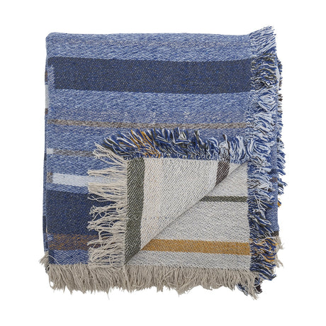 Toscana Striped Cotton Throw in blue, folded to show varied width stripes, fringed edges and a reverse side in cream with mustard and navy accents, on a white background.
