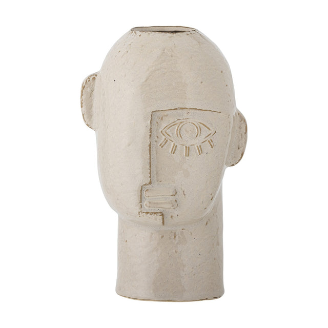 Lizzie Stoneware Vase 25.5cm in beige, shaped like a head with small ears, a raised single-eye face design, and an opening at the crown, set against a plain white background.