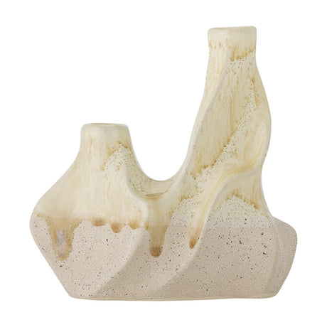 Wavy Speckled Stoneware Candle Holder in cream, with two uneven openings joined by a curved form, glossy glaze dripping onto a sandy speckled base, shown on a plain white background.