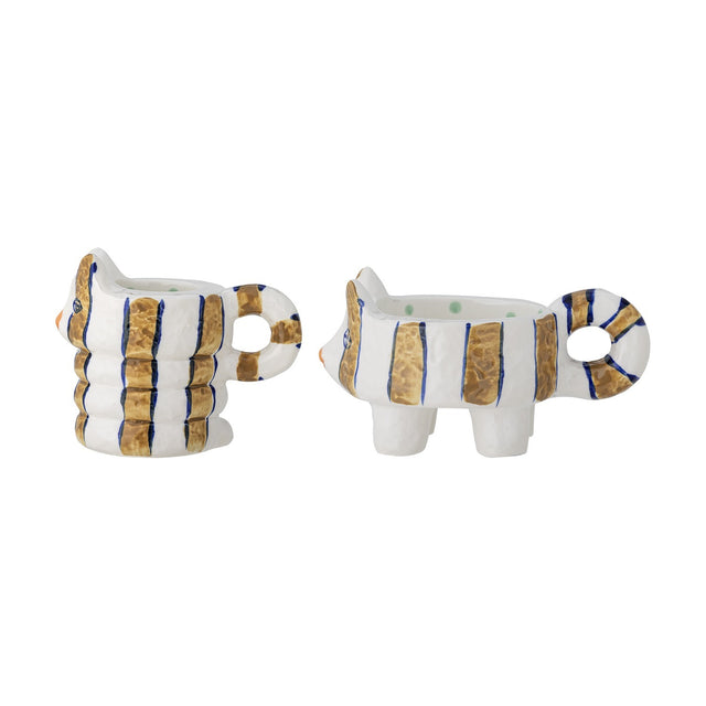 Set of 2 Caty striped stoneware cat candle holders in white and gold, with looped tail handles, one standing and one seated with a ribbed body, on a white background.
