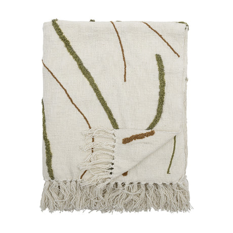 Osasio Cotton Throw in cream, folded, showing tufted olive green and fine brown stitched line patterns with knotted fringe edge, on a plain white background.
