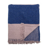 Cadeo Cotton Throw in blue, folded with a contrasting pale taupe band and fringed edges, shown against a plain white background.