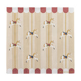 Square paper napkin from the Merry-go-round Christmas pack, printed with carousel horses on poles between striped bands and a red-and-white scalloped canopy edge, shown on a plain white background.