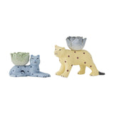Rory Cat Stoneware Candle Holders set of 2, blue spotted cat lying down with a green petal cup and yellow spotted cat standing with a grey petal cup, on a white background.