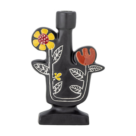 Vivielle Floral Stoneware Candle Holder in black, with a single taper neck and hand-painted yellow and orange flower heads joined by fine leaf outlines, on a plain white background.