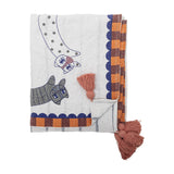 Missy Striped Throw in multicoloured cotton blend, folded on a white background, showing cat motifs, scalloped and checked border, and pink corner tassels.