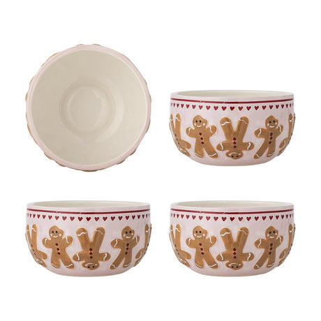 Set of four Binna stoneware Christmas bowls, 12.5cm, in pink with embossed gingerbread figures and a heart border, shown from top and side views on a white background.