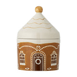 Gina Stoneware Christmas Storage Jar with Lid, 1150ml, brown gingerbread house design with painted windows, door and wreath, pointed cream lid with wooden knob, on a white background.