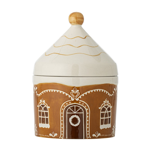 Gina Stoneware Christmas Storage Jar with Lid, 1150ml, brown gingerbread house design with painted windows, door and wreath, pointed cream lid with wooden knob, on a white background.