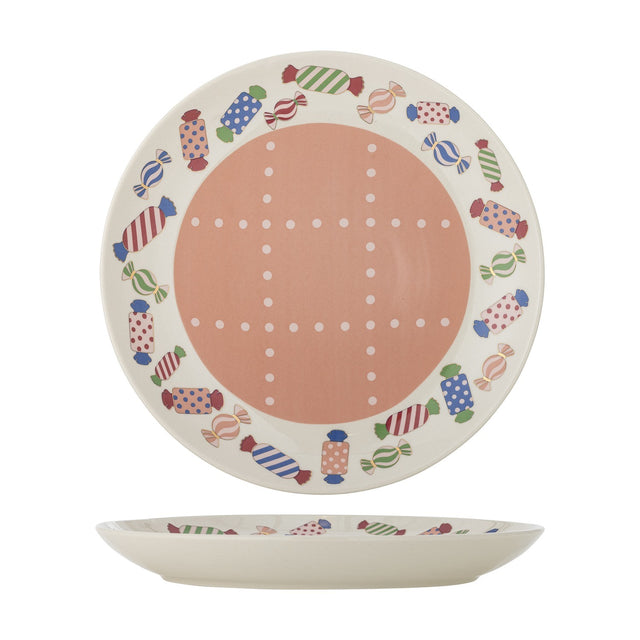 Caramella Stoneware Christmas Dinner Plate in multicoloured, featuring a rim of wrapped sweet motifs and a pink centre with a dotted grid, shown front and side view on a white background.