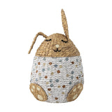 Villja Rabbit Water Hyacinth Basket with Lid in Multi, a kids storage basket shaped like a sleeping rabbit with woven ears, stitched face details, and a polka-dot body, shown on white.