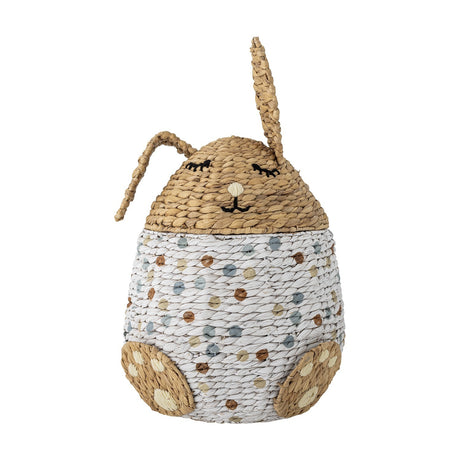 Villja Rabbit Water Hyacinth Basket with Lid in Multi, a kids storage basket shaped like a sleeping rabbit with woven ears, stitched face details, and a polka-dot body, shown on white.