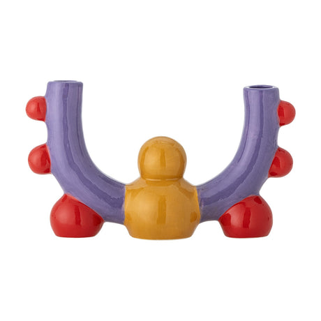 Edivia stoneware candle holder for two candles, U-shaped purple arms with red ball accents and a central yellow figure, on a plain white background.
