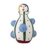 Conneli Ceramic Vase 33cm in Multi, figure-shaped with a painted face, green and red stripes, purple dots, and rounded blue knobs on a white body, shown on a plain white background.