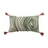 Woodsby Cotton Cushion in cream with a green wood-grain swirl pattern, tufted raised lines, pink tassels at each corner, on a plain white background.