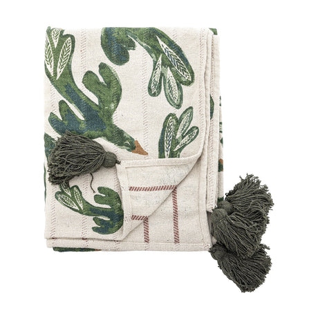 Birdliva Cotton Throw in Multi, folded showing a hand-drawn style bird and leaf print in green tones with grey tassel ties, on a plain white background.