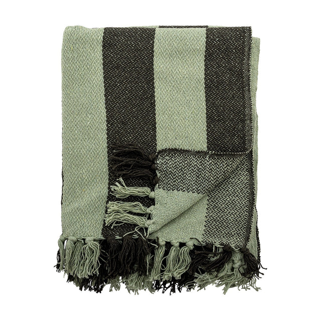 Frello Striped Cotton Throw in Green, folded with broad woven stripes in pale and deep green and knotted fringe tassels, shown on a white background.