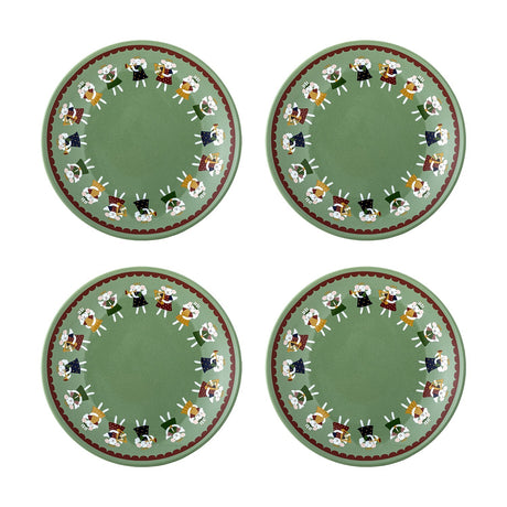 Set of four Peo stoneware Christmas side plates in green, each with a painted ring of angels holding trumpets and harps inside a scalloped border, shown on a white background.