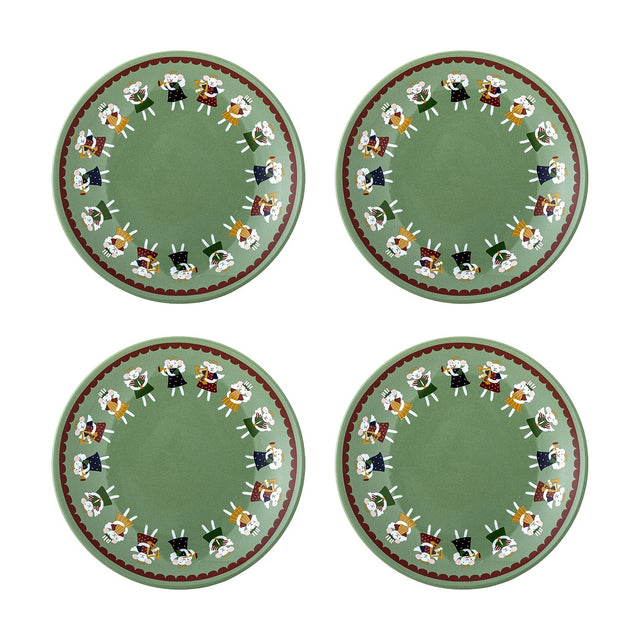 Set of four Peo stoneware Christmas side plates in green, each with a painted ring of angels holding trumpets and harps inside a scalloped border, shown on a white background.