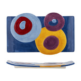 Polivia Geometric Ceramic Tray in Multi, a rectangular dolomite serving tray hand-painted with overlapping blue, red, yellow and purple circles, shown flat and side-on against a white background.
