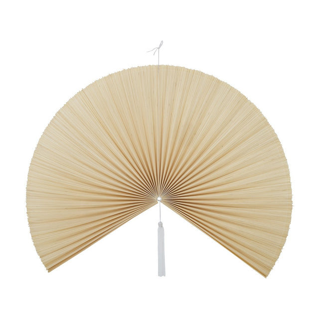 Jaime Bamboo Wall Decor 110cm in natural finish, a pleated bamboo fan shape with a white tassel hanging from the centre, shown on a plain white background.