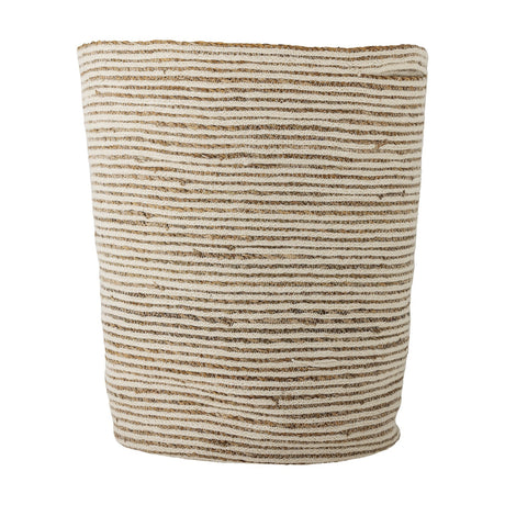 Selena Jute Basket in White, a tall round storage basket with alternating horizontal bands of white jute and natural seagrass, tapered base, and a braided rim, shown on a plain white background.