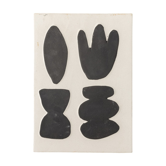 Lutton Stoneware Wall Decor in white, a rectangular ceramic panel with four dark organic shapes—a leaf, a budded form, an hourglass and stacked pebbles—on a plain background.