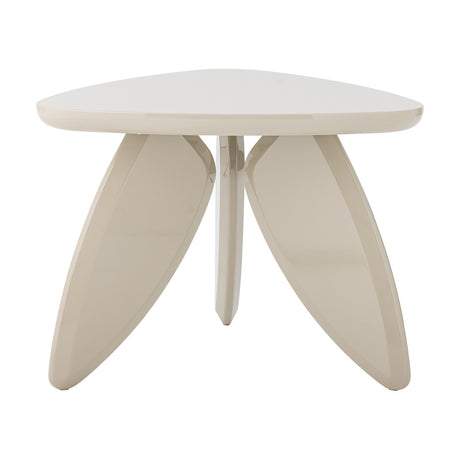 Magia Coffee Table in beige high-gloss MDF, featuring a rounded triangular top on three flat, petal-shaped splayed legs, shown on a plain white background.