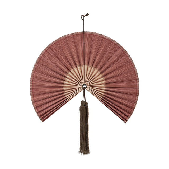 Jaime Bamboo Wall Decor in pink, a pleated fan-shaped wall art piece with a long hanging tassel at the hub, shown on a plain white background.
