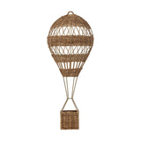 Huggi Rattan Wall Basket in Natural, a hot air balloon shaped wall basket with woven rattan bands over a slim iron frame and a small basket below, shown on a white background.