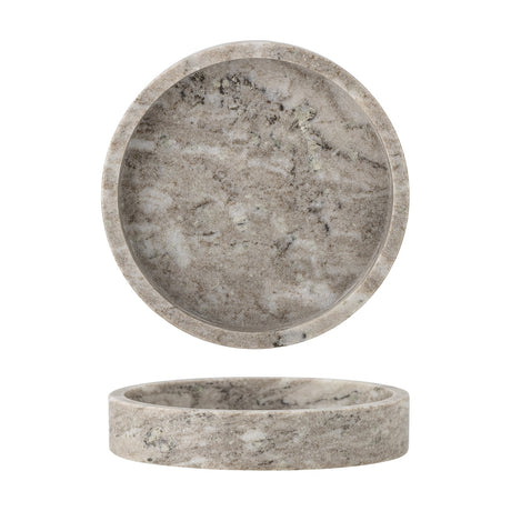 Ivette Round Marble Tray in grey, shown from above and in profile with a shallow straight rim and natural veining, set on a plain white background.