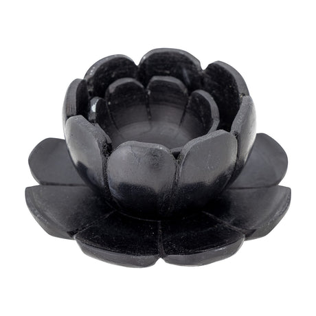 Reiko Flower Marble Tealight Holders in black, a petal-edged holder nested on a flower-shaped tray, shown on a plain white background.