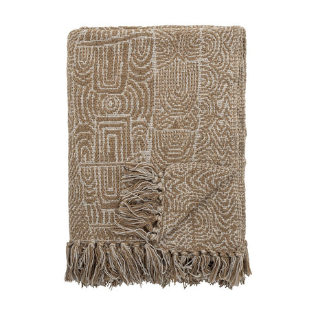 Bresso Cotton Throw in brown, folded, showing a woven geometric pattern of arches and loops with matching knotted fringe, on a plain white background.