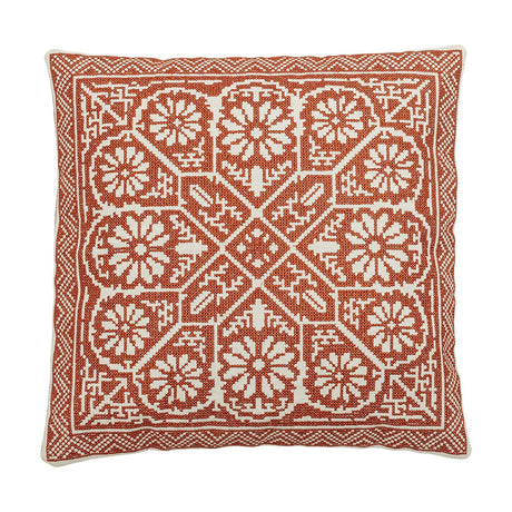 Red 40cm square cotton cushion with woven cross-stitch floral embroidery, a central flower medallion, geometric corner motifs and a patterned border.