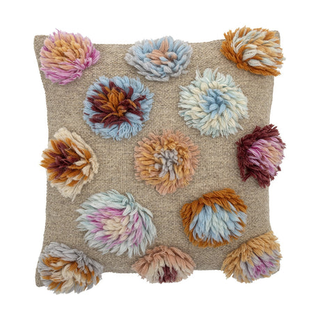 Somma Wool Cushion in Multi, a square woven cushion in beige with raised, shaggy multicoloured yarn tufts arranged across the front, shown on a plain white background.