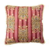 Poirino Cotton Cushion in pink, square with striped tiger print in gold and black across pink bands, cream fringe trim on all edges, shown on a plain white background.
