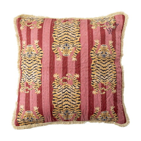 Poirino Cotton Cushion in pink, square with striped tiger print in gold and black across pink bands, cream fringe trim on all edges, shown on a plain white background.