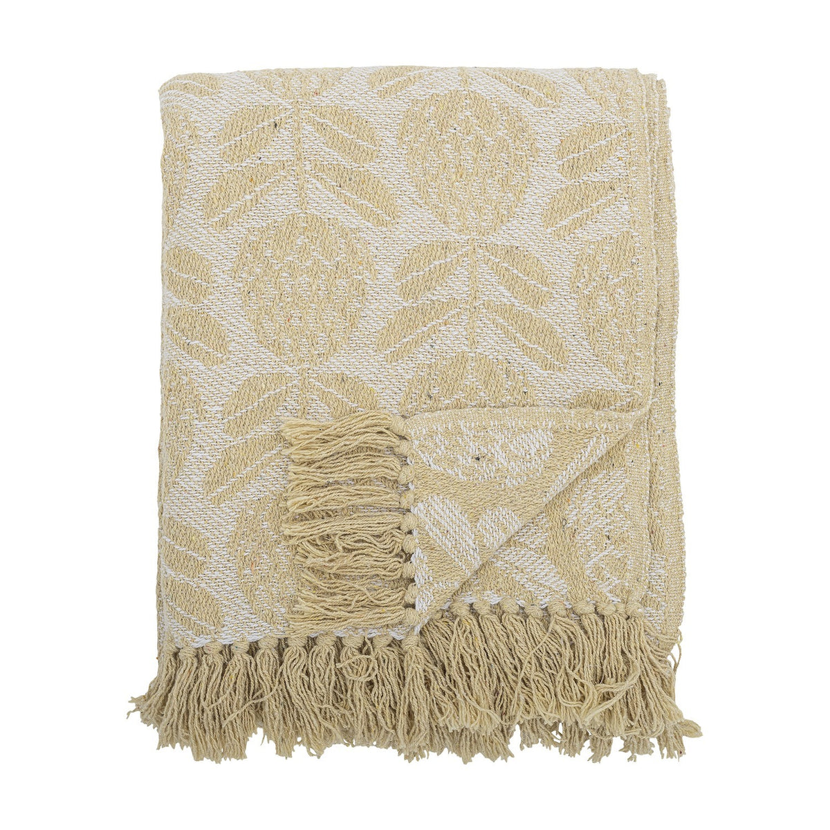 Pratello Throw in yellow, a woven fabric throw with a leafy floral pattern on a lighter ground, finished with fringed edges, folded on a plain white background.