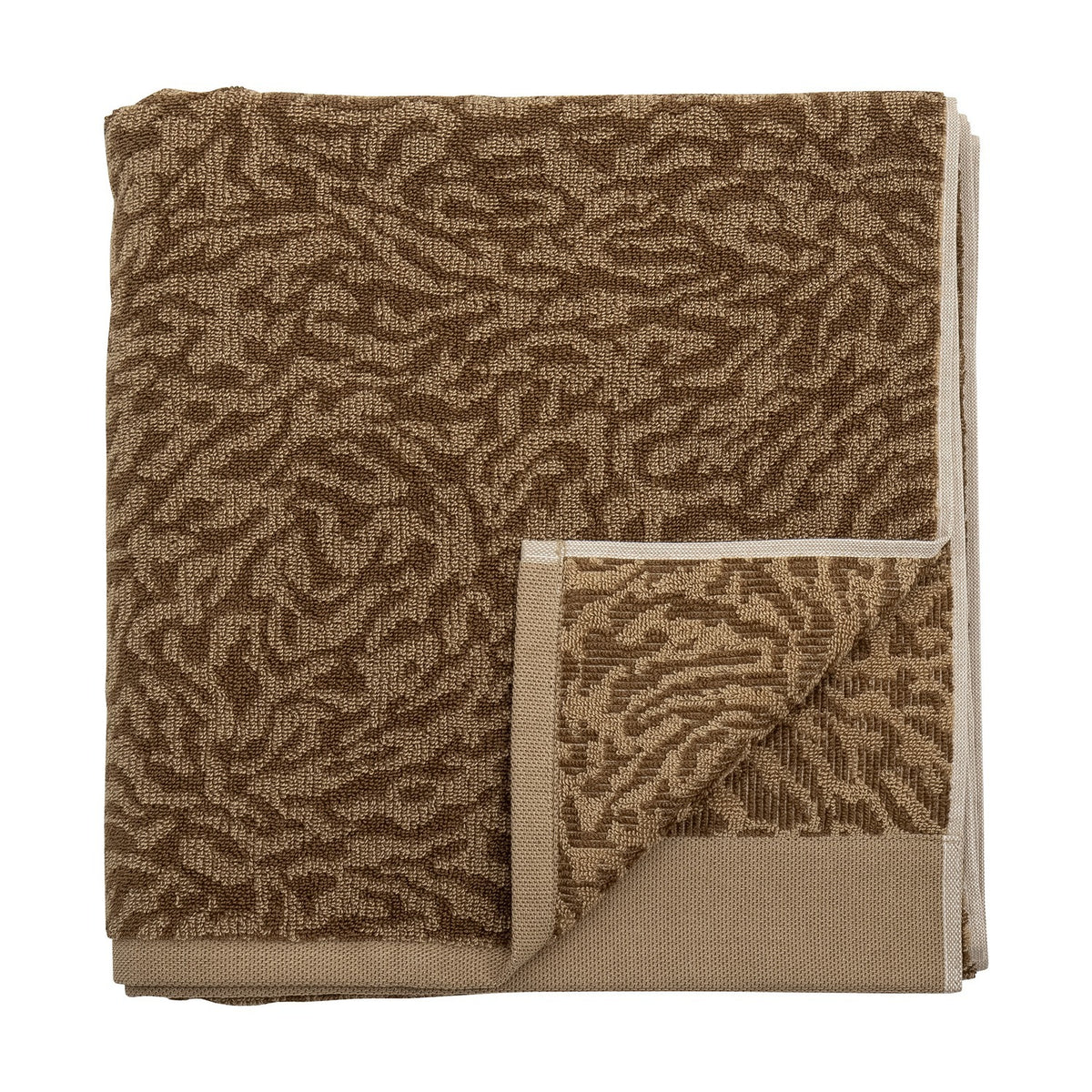 Kaysa Cotton Towel 140x70cm in brown, folded with a woven curling-branch pattern in light and dark tones and a plain beige border, shown on a white background.