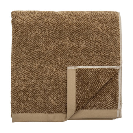Kahla Cotton Towel 140x70cm in Brown, folded square with a two-tone herringbone weave and smooth flat-woven border, shown on a white background.