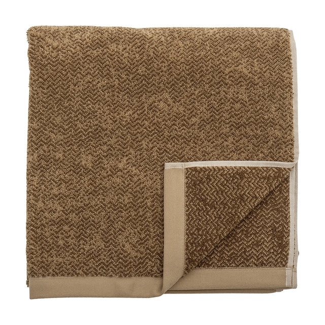 Kahla Cotton Towel 140x70cm in Brown, folded square with a two-tone herringbone weave and smooth flat-woven border, shown on a white background.